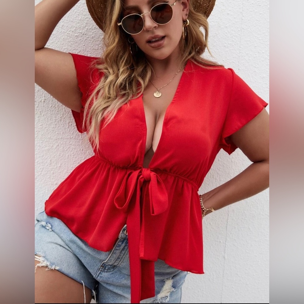 Tie front ruffle hem top